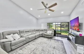 Vaulted ceilings give the room a spaciou feel