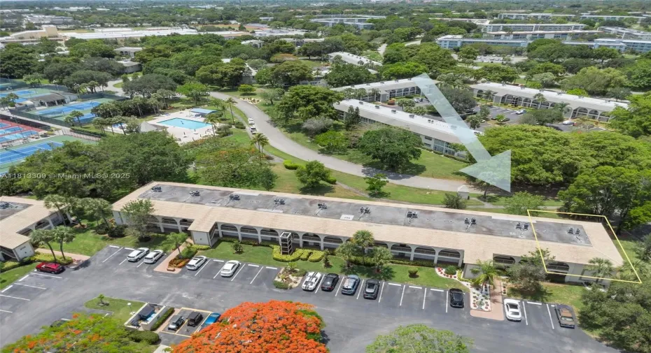 Superior location: Close to pool & courts. Corner unit.