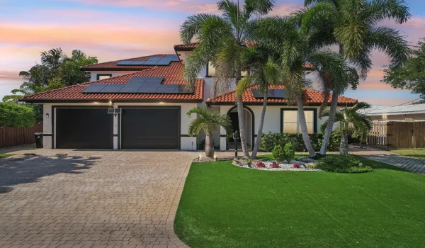 This south-facing home enjoys steady natural light throughout the day while staying cooler in the afternoons, since it’s shielded from the harsh western sun. This orientation boosts energy efficiency and makes outdoor spaces like patios and lanais more enjoyable, especially during hot summer months. It’s also ideal for solar panel installation, maximizing sun exposure for long-term energy savings.