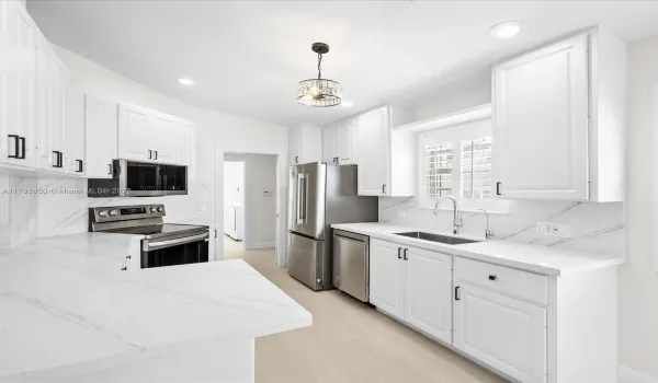 Renovated with sleek quartz counter tops and brand new LG appliances.