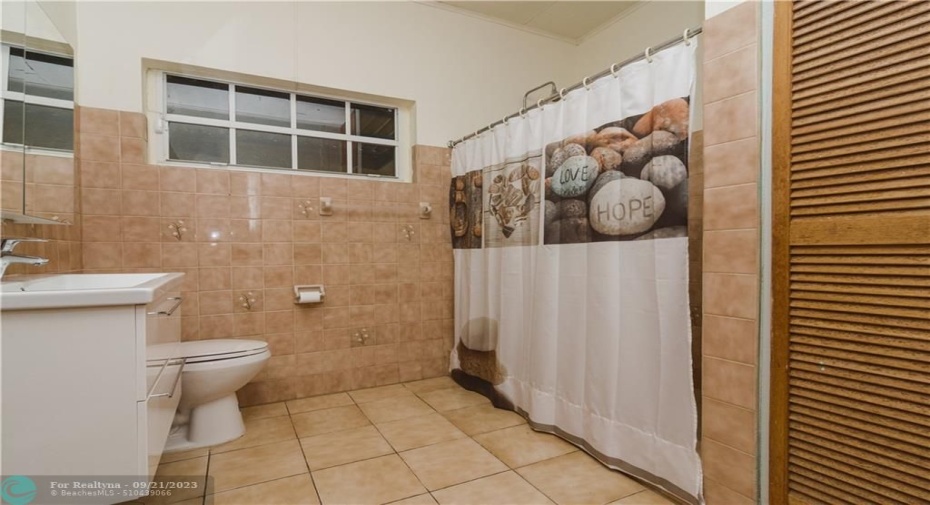 Very spacious and renovated bathroom with build in closet space