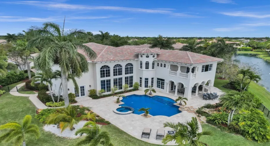 Magnificent 6000+ sq ft residence on point lakefront lot of over a 1/2 acre with 3 distinct yards and stunning views of the lake from everywhere!