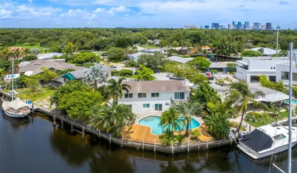 Stunning 5 Bdr/3 Bthr Private Residence situated on a premier point lot with over 100 F of yacht-friendly water-frontage with ocean access.
