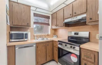 Brand new stainless steel appliances.