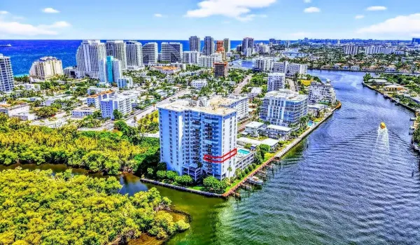 Aerial view with Bonnet House to the left, South view of  Intracoastal. Unit highlighted in in red