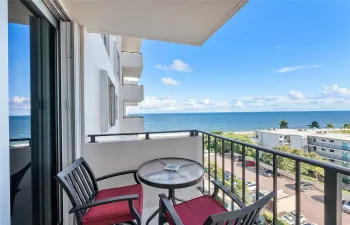 East half of balcony - direct view of ocean  Other half has a loveseat facing east.