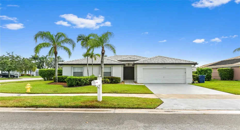Corner lot home is  zoned for excellent rated  Stoneman Douglas High School