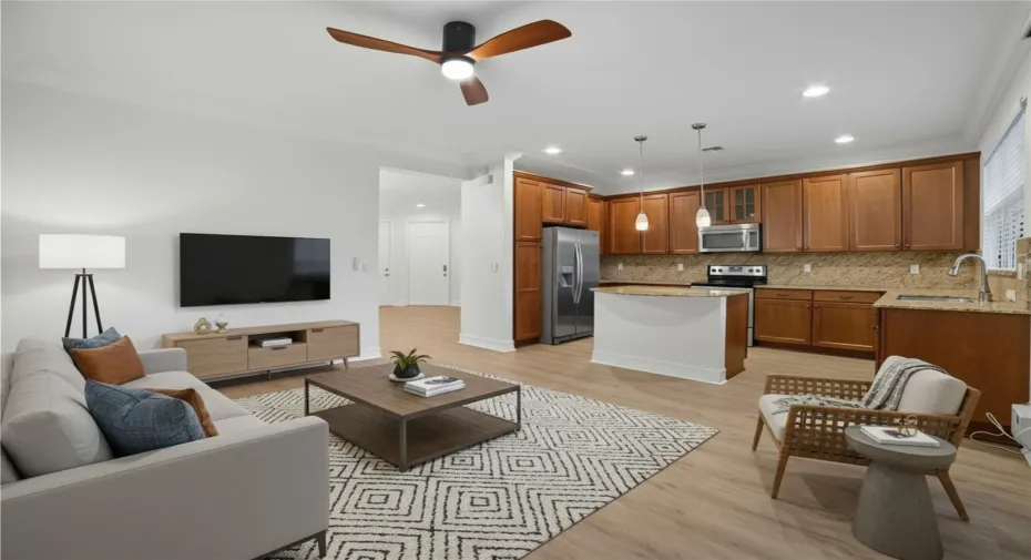 This photo showcases a virtually staged Den, offering a comfortable and inviting space for relaxation and entertainment. The design incorporates a blend of modern and classic elements, creating a warm and sophisticated ambiance.