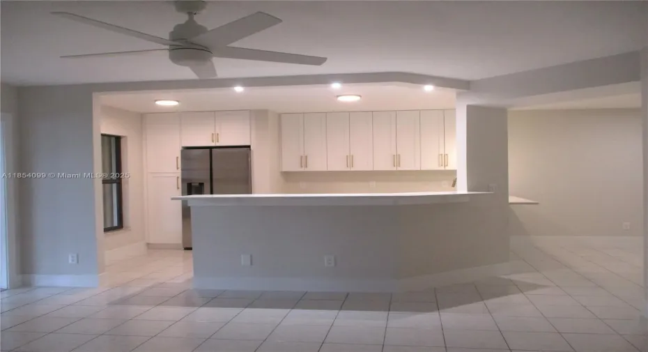 OPEN AIRY KITCHEN/DINING/LIVING AREA