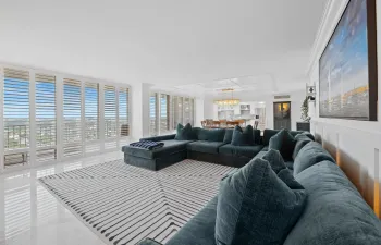 Huge living and dining area with floor to ceiling glass
