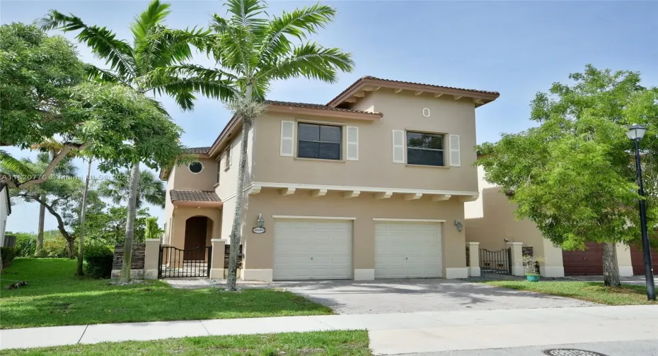 GORGEOUS CORNER 2 BEDROOM HOME WITH SIDE ENTRANCE