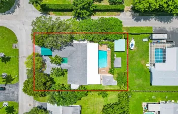 1/4 ACRE 4/3.5 POOL HOME SITTING ON A CORNER LOT