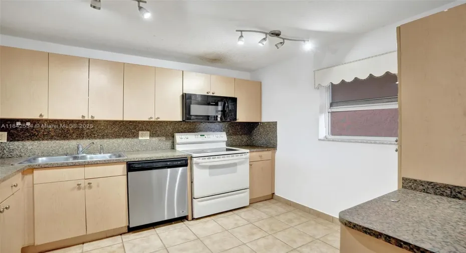 Updated Cabinets with added Pantry!