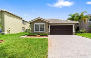 Beautifully updated 4 BD, 2 BA one-story home in gated Silver Isles community.