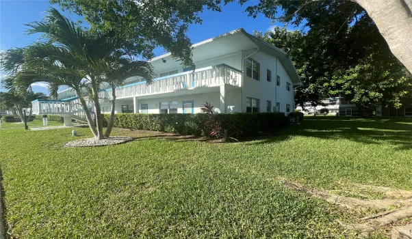 FIRST FLOOR CORNER CONDO