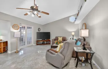 Spacious living areas wth 12' soaring ceiling. All knockdown finished ceilings.