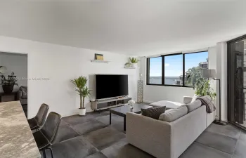 Step into this bright and open living space, where large windows offer stunning views of Biscayne Bay. Desirable split floor plan, ensuring privacy and functionality