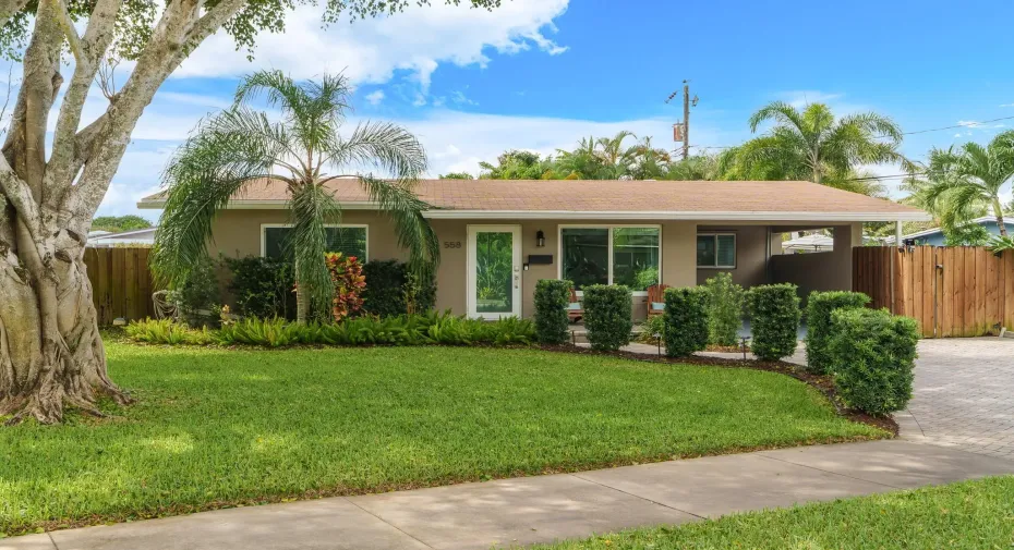 Situated on a corner lot within two blocks of Wilton Drive