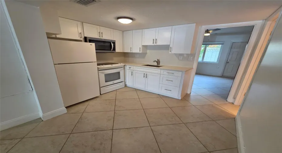 Updated kitchen with quartz counter tops