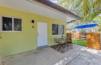 Entry to apartment and side yard