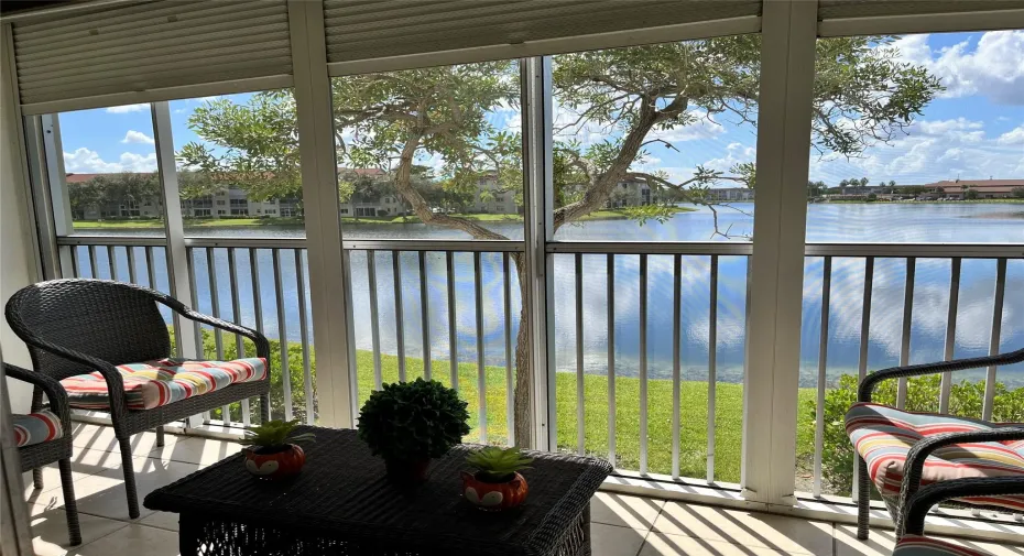 Screened balcony with beautiful lake view.