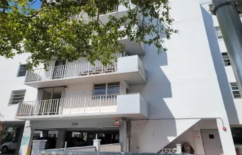 View of Apartment Balcony from Outdoors.