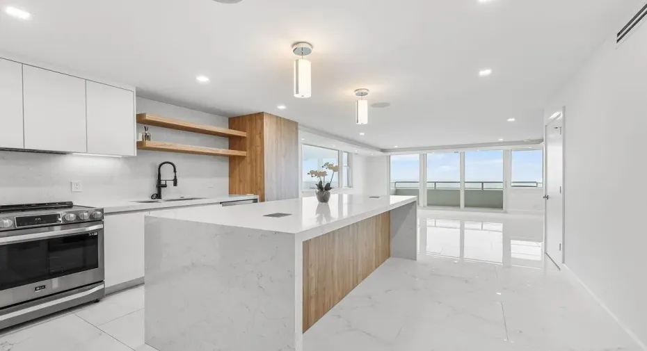 Completely upgraded kitchen, new appliances with pop up countertop outlets.