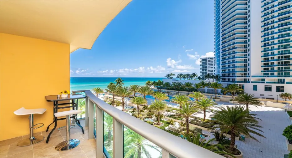 Balcony view- pool, ocean and beach