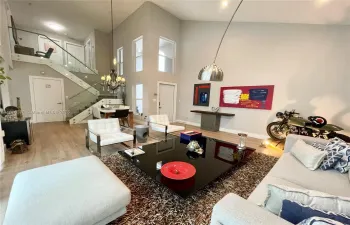Glass stair rails, smooth ceilings and LED light through out.