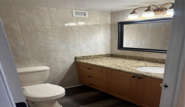 1/2 bath located in living area