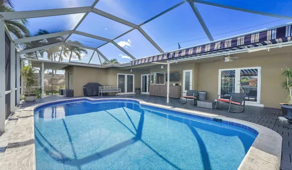 Wow look at your pool. You can get to it from two of the bedrooms and the kitchen.