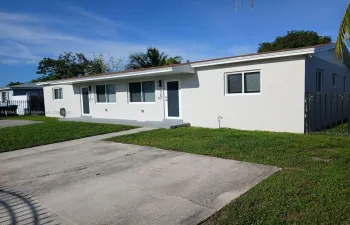 Property Entrance. It has fenced parking lot and impact windows. Patio entrance is independent.