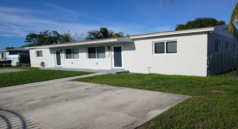 Property Entrance. It has fenced parking lot and impact windows. Patio entrance is independent.