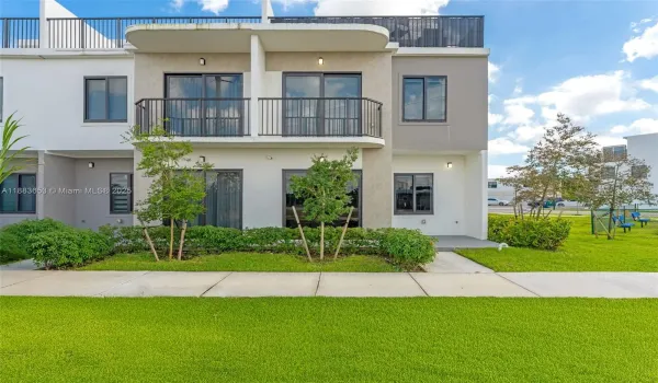 Beautiful corner unit with modern façade, landscaped front area, and a kids park right on the corner.