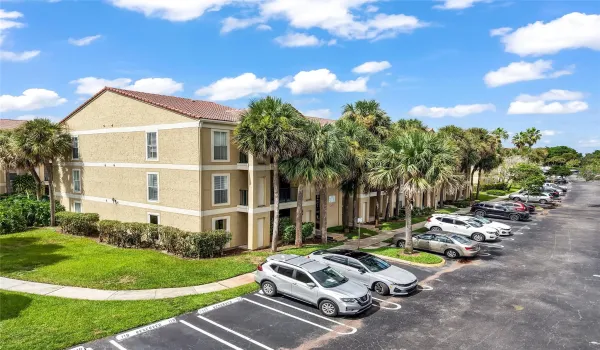 Corner 1st Floor unit with Impact Windows & Doors.