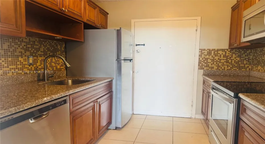 Kitchen - Wood Like Cabinets & Backsplash