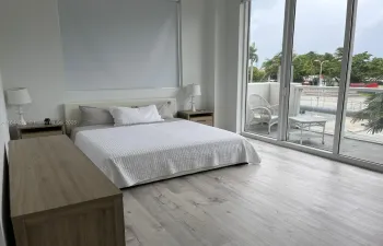 Huge primary bedroom with king size bed electric black out, big balcony and walking closet