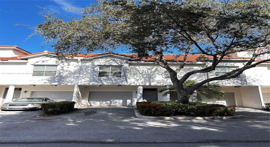FRONT OF TOWNHOUSE WITH ONE CAR GARAGE
