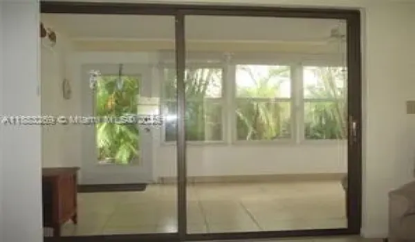 PRIVATE ENCLOSED PATIO WITH TROPICAL VIEW