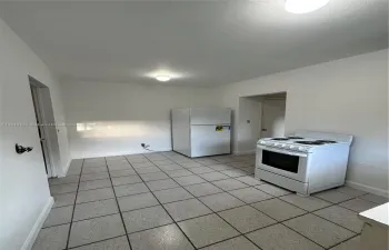 Eat in kitchen with a bedroom on each side