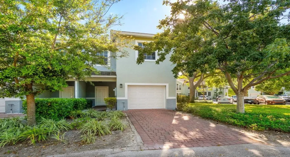 Corner Unit is surrounded by mature trees and beautiful open areas