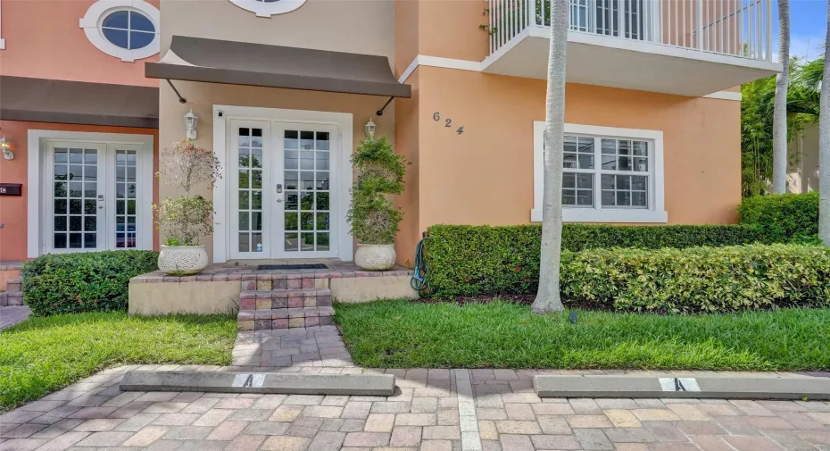 Front entry to Unit A with private double-door access.