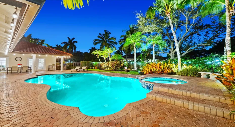 Welcome to this magnificent resort-like retreat in the heart of the most upscale enclave in Davie's Shenandoah!
