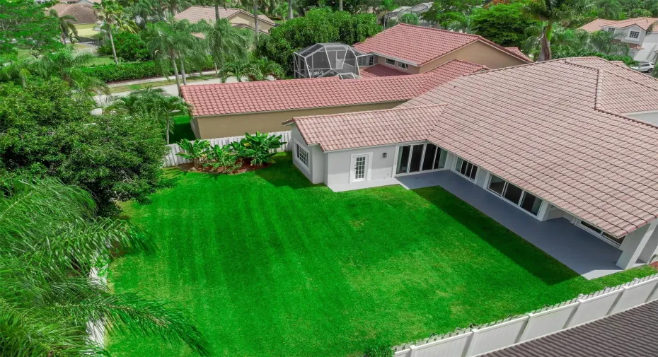 The fully fenced backyard retreat and long covered patio offer privacy and security for outdoor entertainment, with plenty of room for a pool (but who needs one, when the gorgeous community pool is just steps away!)