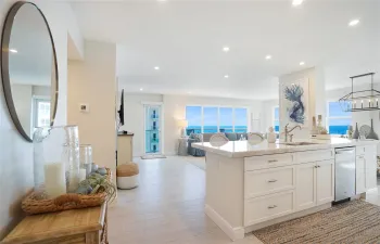 Welcome to this elegant and coastally inspired 21st floor northeast corner oceanfront home.