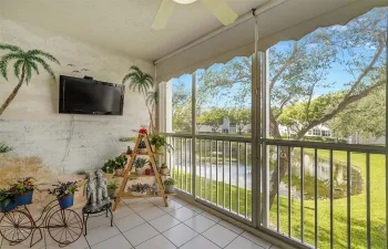 Sunrise Lakes Community Offers this Active 55+ Lakefront Condo that is Move-In Ready, Bright 2-Bed/2-Bath with Waterfront Views from the Primary & Air-Conditioned Enclosed Balcony. Being Sold Furnished & In-Unit Laundry!