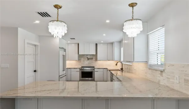 Custom cabinets waterfall countertop