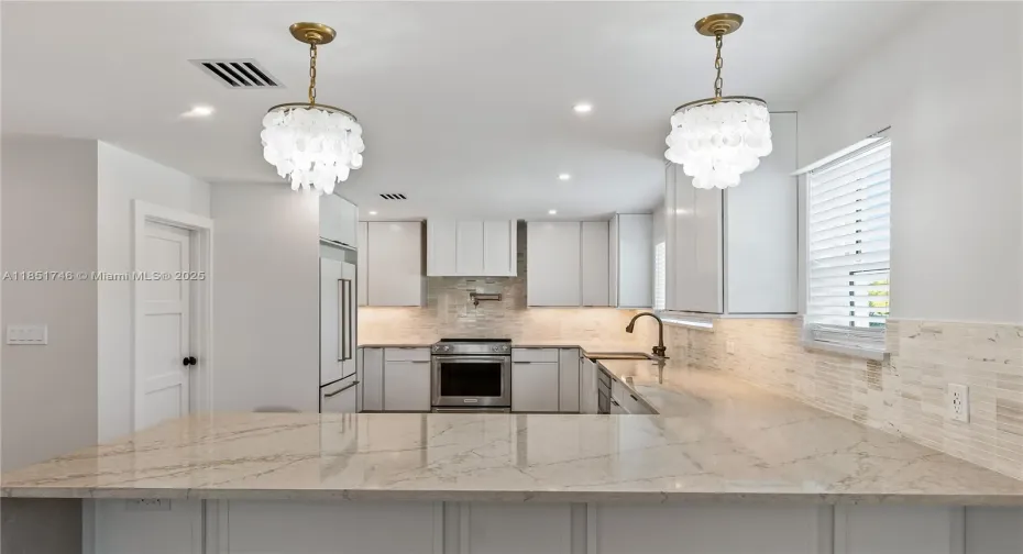 Custom cabinets waterfall countertop