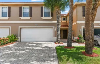 Two Car Garage with brick paver driveway