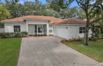 At the front of the house there is space to park 4 vehicles. All the trees around the back of the property help give shade and keep the house cooler during the hot summer months.